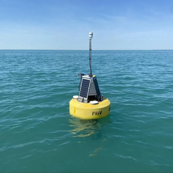 Yellow monitoring buoy with a solar-panel tower and instruments for collecting lake observations.